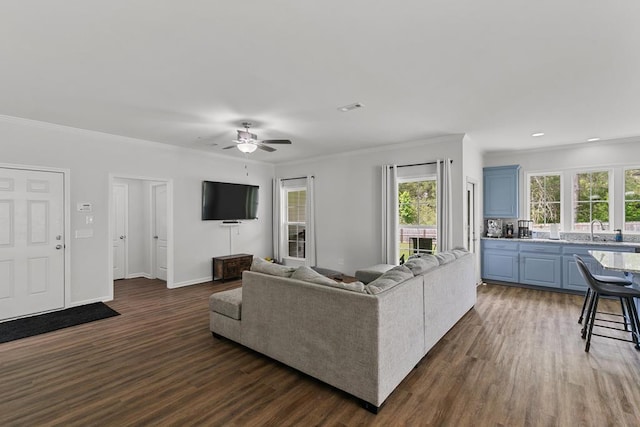 living room featuring recessed lighting, ceiling fan, dark wood finished floors, and ornamental molding