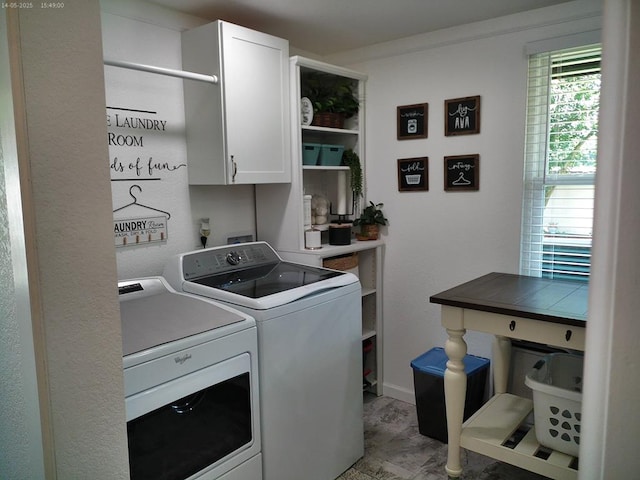 4301 County Road 156, Enterprise, AL 36330 - laundry room featuring cabinet space, washing machine and dryer, and baseboards