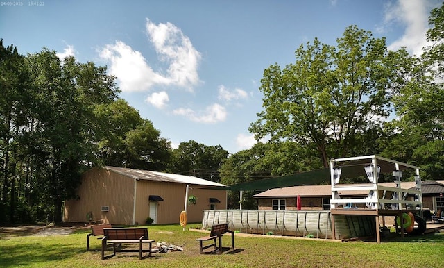 4301 County Road 156, Enterprise, AL 36330 - view of grassy yard featuring an outbuilding
