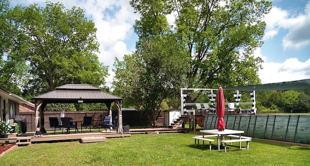 4301 County Road 156, Enterprise, AL 36330 - view of yard featuring a wooden deck, a gazebo, and a storage unit