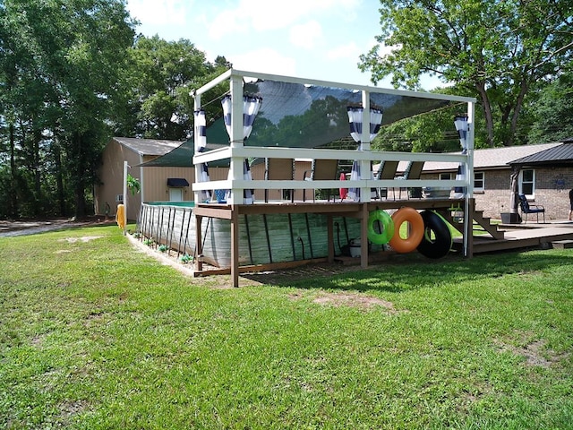 4301 County Road 156, Enterprise, AL 36330 - back of house featuring a deck and a yard