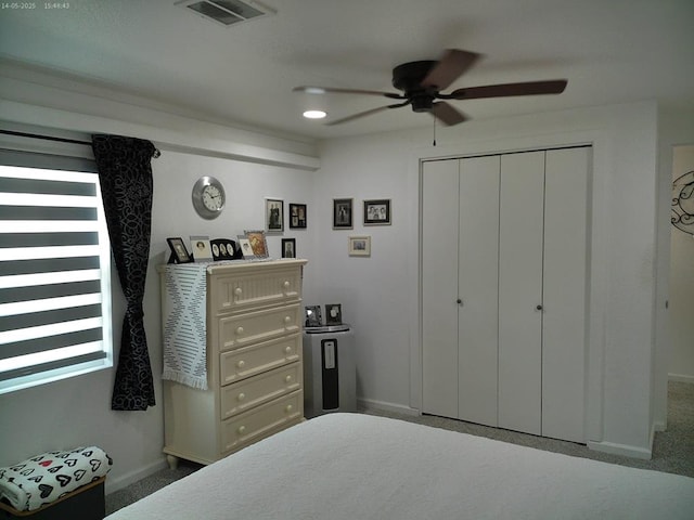 4301 County Road 156, Enterprise, AL 36330 - bedroom featuring baseboards, a closet, a ceiling fan, and carpet floors