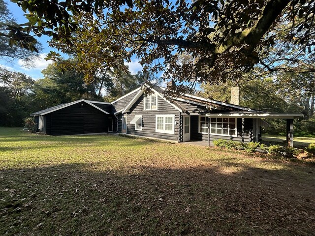 exterior space with a lawn