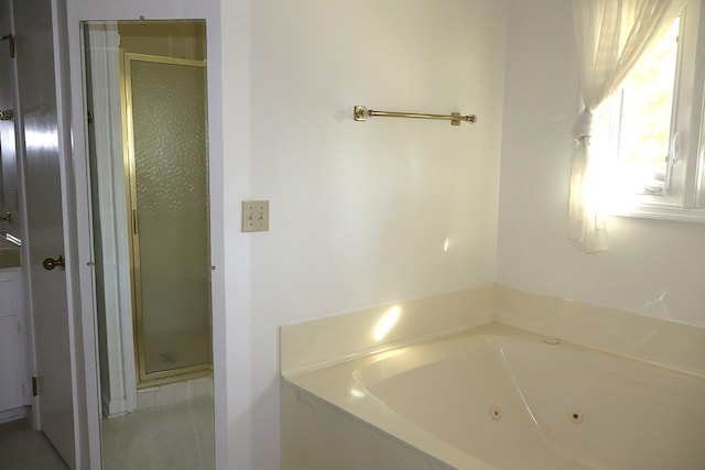 bathroom with independent shower and bath