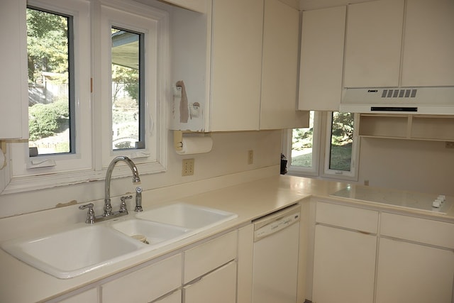 kitchen featuring stovetop, ventilation hood, white cabinetry, and white dishwasher