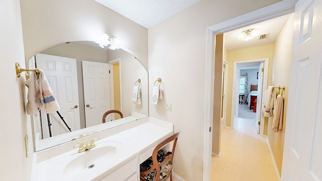 1109 Sanitary Dairy Rd, Cowarts, AL 36321 - bathroom featuring baseboards, visible vents, and vanity