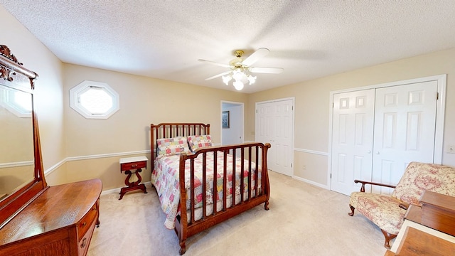 1109 Sanitary Dairy Rd, Cowarts, AL 36321 - bedroom with baseboards, a textured ceiling, ceiling fan, and light carpet