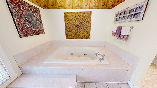 1109 Sanitary Dairy Rd, Cowarts, AL 36321 - bathroom with a jetted tub and tile patterned floors