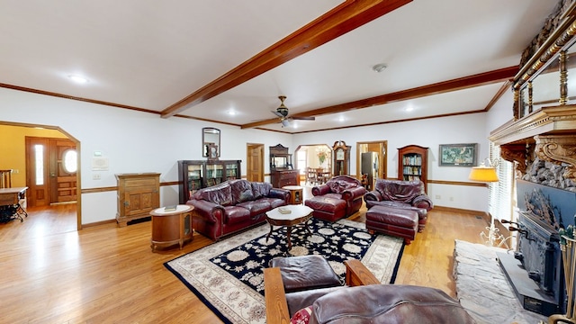 1109 Sanitary Dairy Rd, Cowarts, AL 36321 - living area featuring beamed ceiling, ceiling fan, light wood-type flooring, and a fireplace