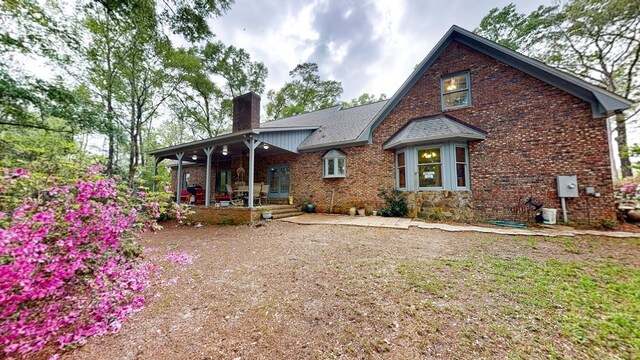 1109 Sanitary Dairy Rd, Cowarts, AL 36321 - back of property featuring brick siding and a chimney