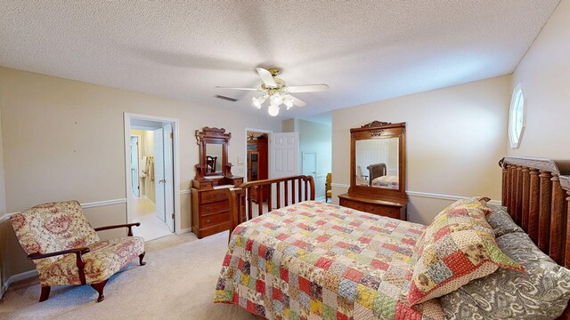 1109 Sanitary Dairy Rd, Cowarts, AL 36321 - bedroom with light colored carpet, baseboards, a textured ceiling, visible vents, and a ceiling fan