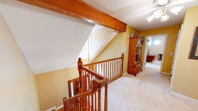 1109 Sanitary Dairy Rd, Cowarts, AL 36321 - hall with a textured ceiling, an upstairs landing, baseboards, and light carpet