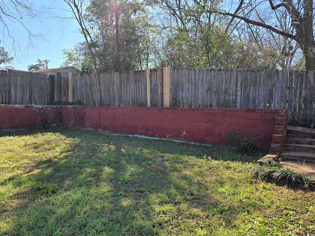 view of yard with fence