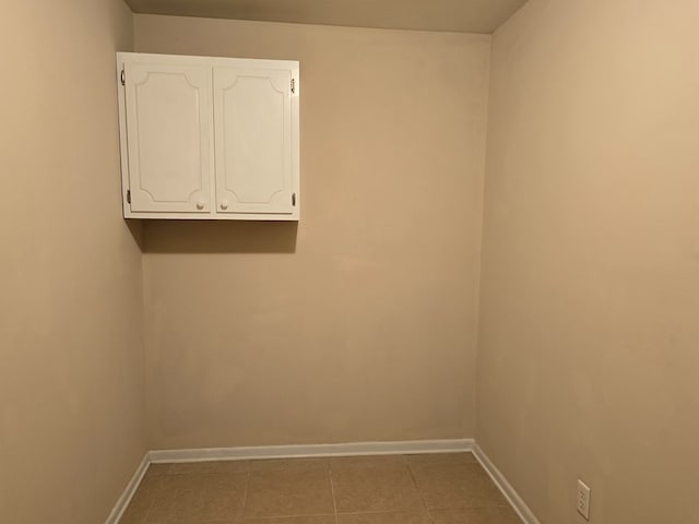 tiled spare room with baseboards