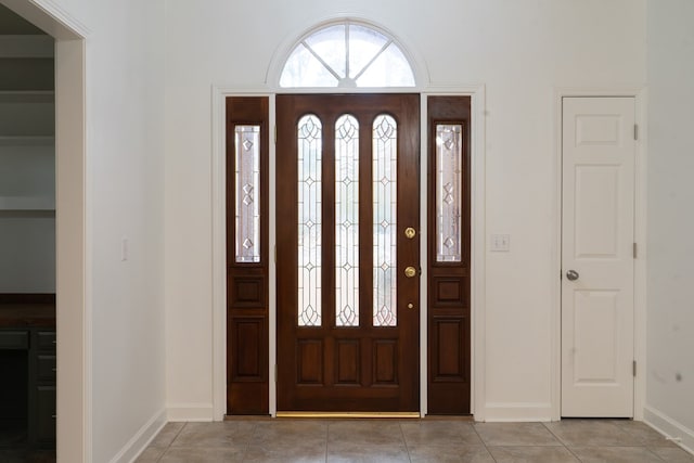 view of tiled foyer entrance