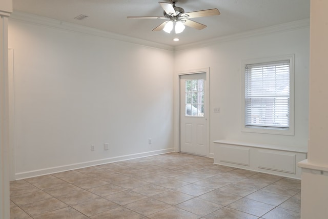 interior space with crown molding and ceiling fan