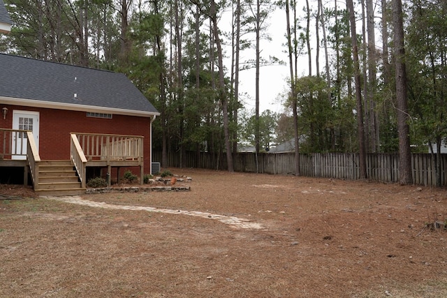 view of yard with a deck