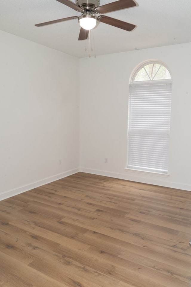 spare room featuring hardwood / wood-style floors