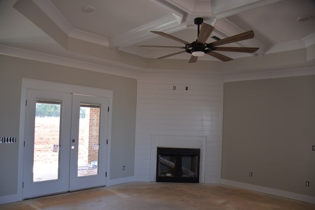 unfurnished living room with a fireplace, french doors, ceiling fan, and beamed ceiling