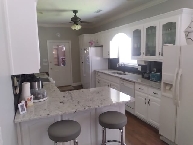 38 Vansant Pl, Dothan, AL 36301 - kitchen with white appliances, a sink, white cabinetry, glass insert cabinets, and ceiling fan