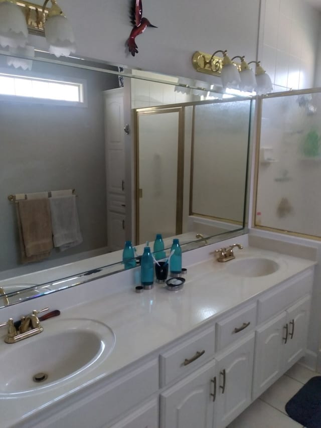38 Vansant Pl, Dothan, AL 36301 - bathroom with double vanity, tile patterned flooring, and a shower stall