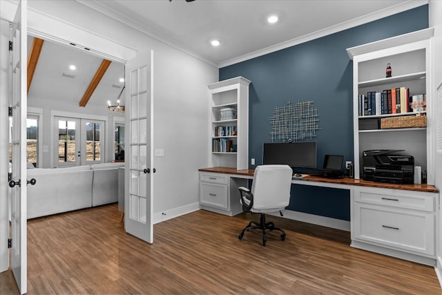 office area featuring french doors, wood-type flooring, built in desk, an inviting chandelier, and vaulted ceiling with beams