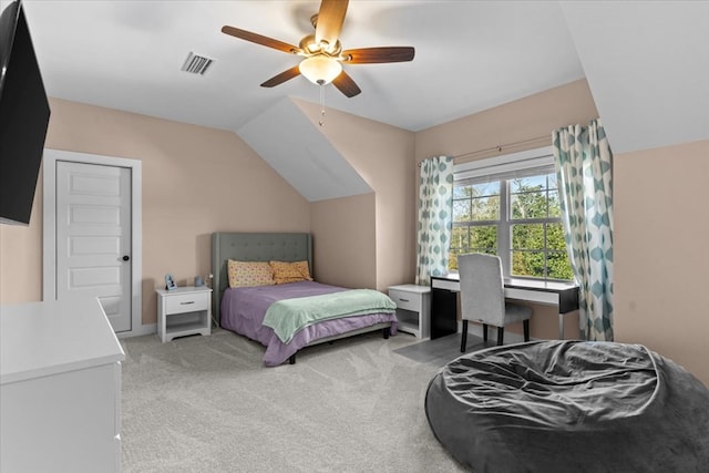 carpeted bedroom featuring ceiling fan and lofted ceiling