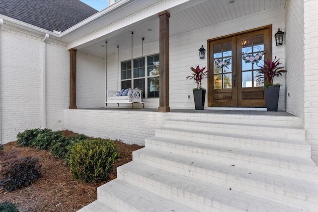 entrance to property with covered porch