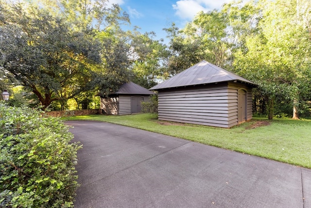 garage with a yard