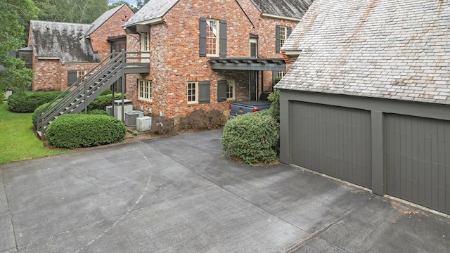 view of home's exterior with cooling unit