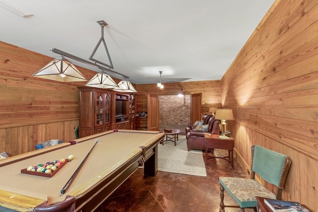 recreation room featuring wooden walls and pool table