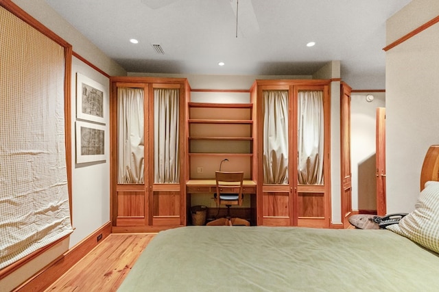 bedroom with light wood-type flooring