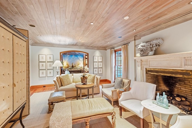 living area featuring light hardwood / wood-style flooring and wood ceiling