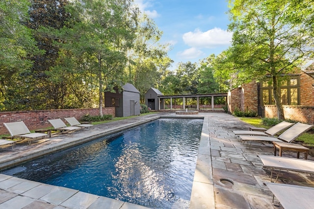 view of pool with a patio