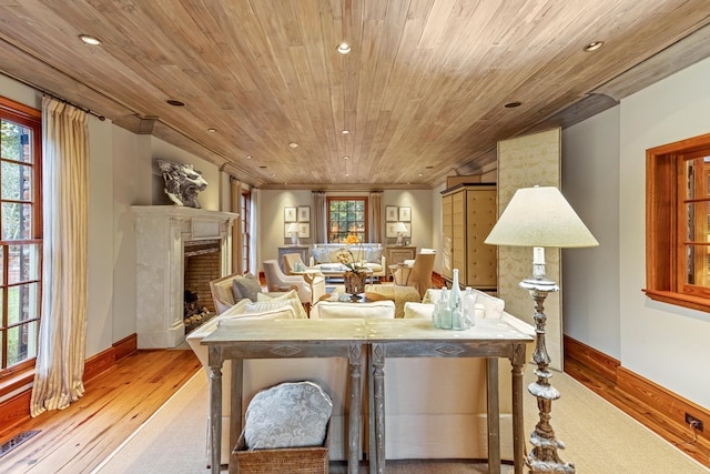 living room featuring wooden ceiling and light wood-type flooring