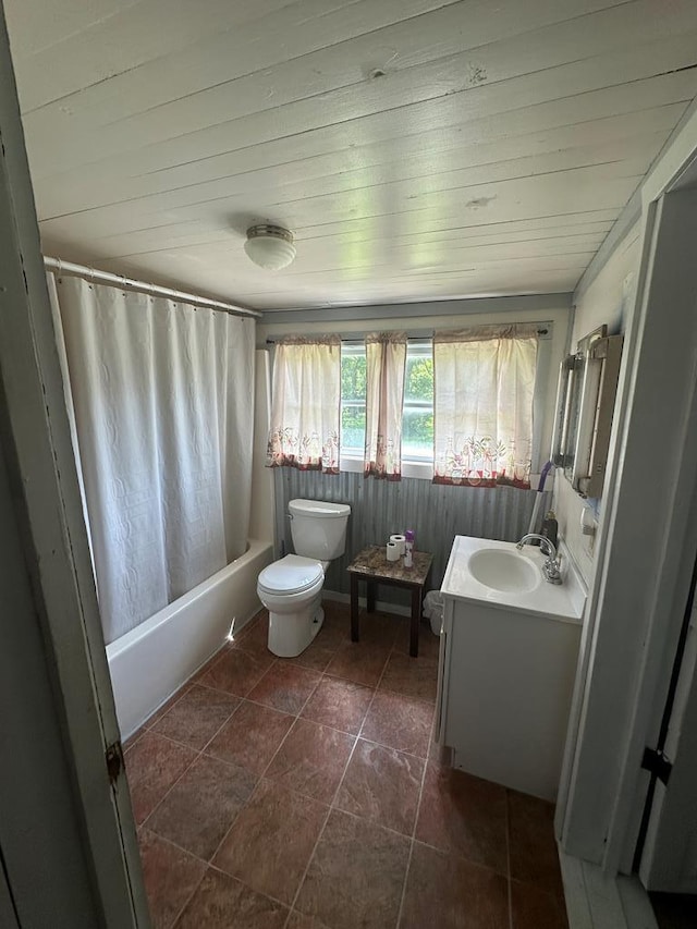 full bathroom with shower / tub combo, tile patterned floors, wood ceiling, vanity, and toilet