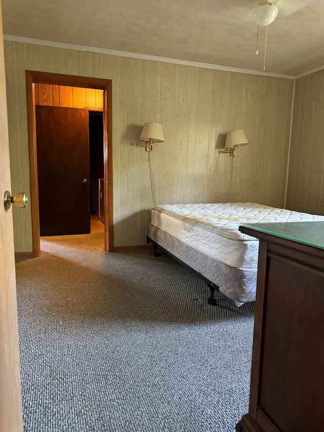 unfurnished bedroom featuring carpet and ornamental molding