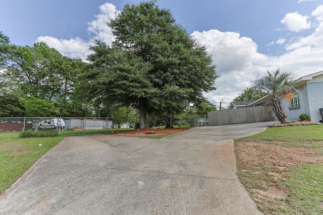 1810 Northside Dr, Dothan, AL 36303 - view of front of home with driveway, fence, and a gate