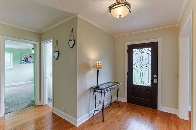 1810 Northside Dr, Dothan, AL 36303 - foyer entrance featuring wood finished floors, baseboards, and crown molding