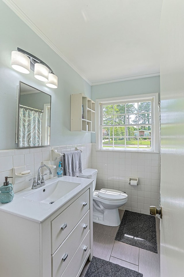 1810 Northside Dr, Dothan, AL 36303 - full bathroom with tile walls, tile patterned floors, toilet, vanity, and crown molding