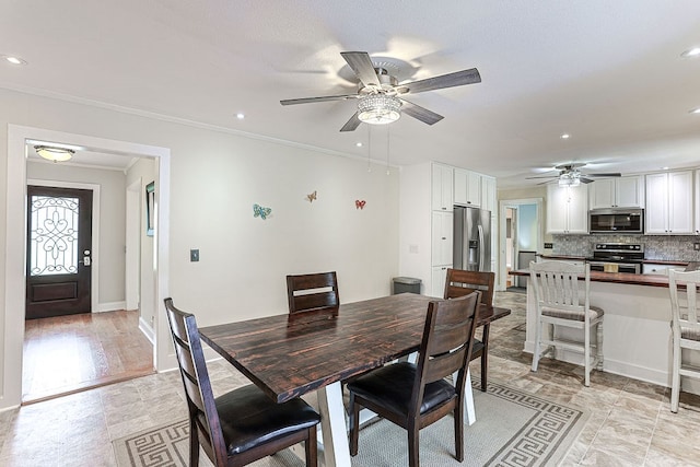 1810 Northside Dr, Dothan, AL 36303 - dining room with ceiling fan, ornamental molding, recessed lighting, and baseboards
