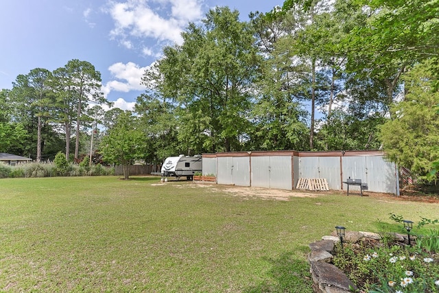 1810 Northside Dr, Dothan, AL 36303 - view of green lawn featuring an outbuilding and view of scattered trees