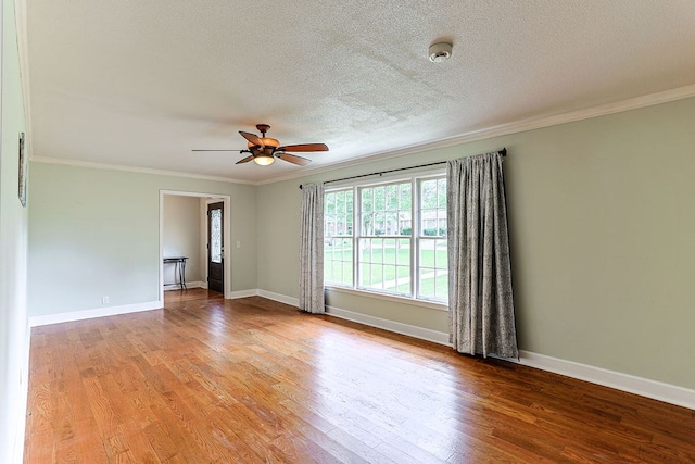 1810 Northside Dr, Dothan, AL 36303 - spare room featuring ceiling fan, wood finished floors, ornamental molding, baseboards, and a textured ceiling