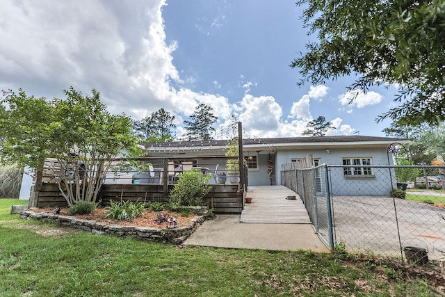 1810 Northside Dr, Dothan, AL 36303 - view of front facade with stucco siding and a gate