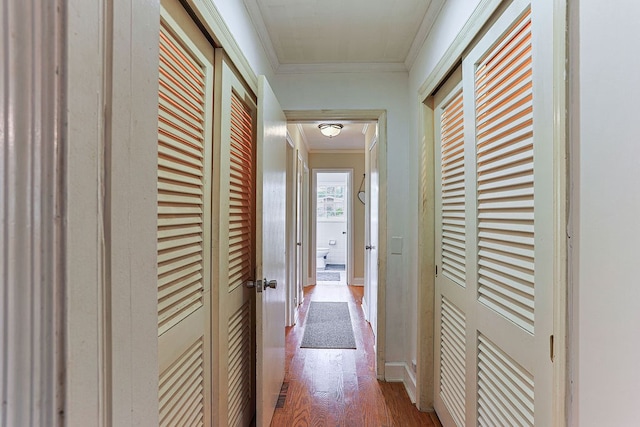 1810 Northside Dr, Dothan, AL 36303 - hallway featuring wood finished floors, ornamental molding, and baseboards