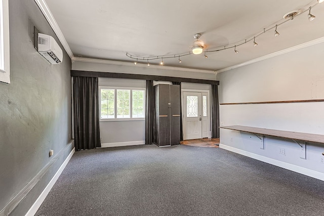 1810 Northside Dr, Dothan, AL 36303 - unfurnished room featuring ornamental molding, baseboards, a wall unit AC, carpet floors, and rail lighting
