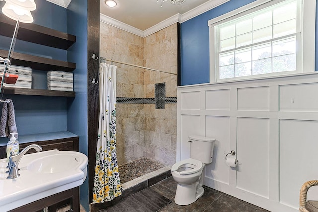 1810 Northside Dr, Dothan, AL 36303 - bathroom featuring ornamental molding, a sink, tiled shower, toilet, and tile patterned flooring