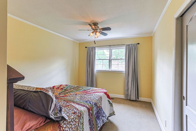 1810 Northside Dr, Dothan, AL 36303 - bedroom featuring crown molding, carpet, a textured ceiling, a ceiling fan, and baseboards