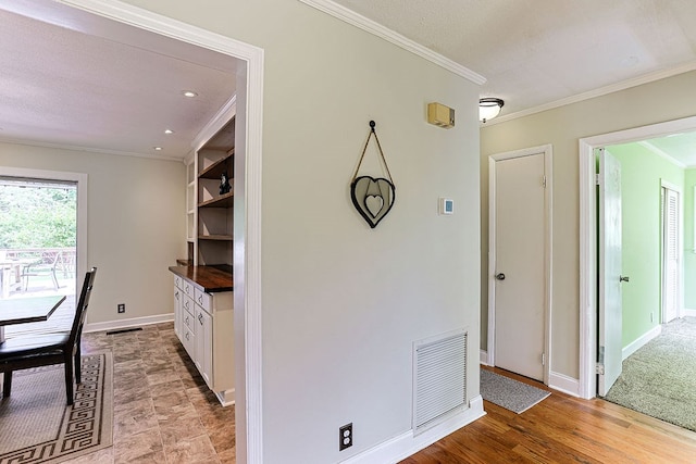 1810 Northside Dr, Dothan, AL 36303 - kitchen with crown molding, white cabinets, baseboards, open shelves, and recessed lighting