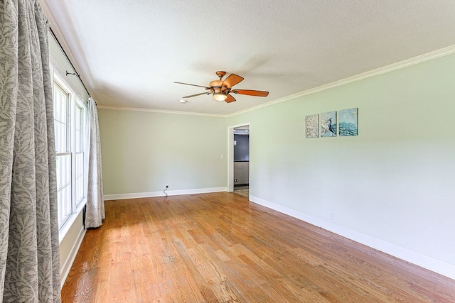 1810 Northside Dr, Dothan, AL 36303 - spare room with a ceiling fan, wood finished floors, baseboards, and ornamental molding